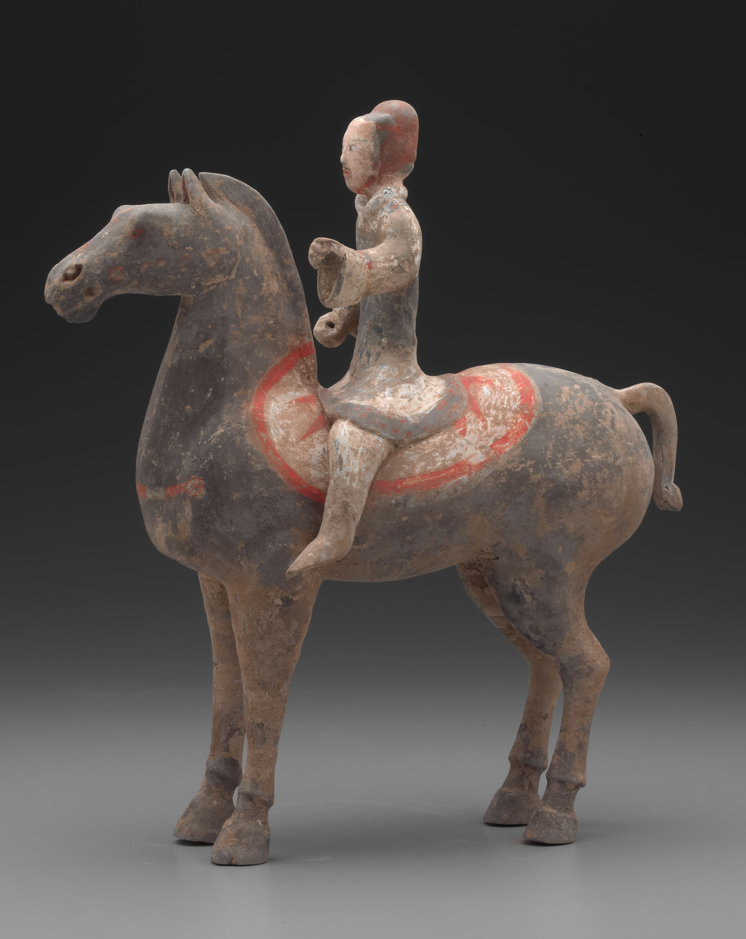 Funerary statuette of an equestrian, earthenware with pigments, Western Han dynasty, China, second to first century BCE